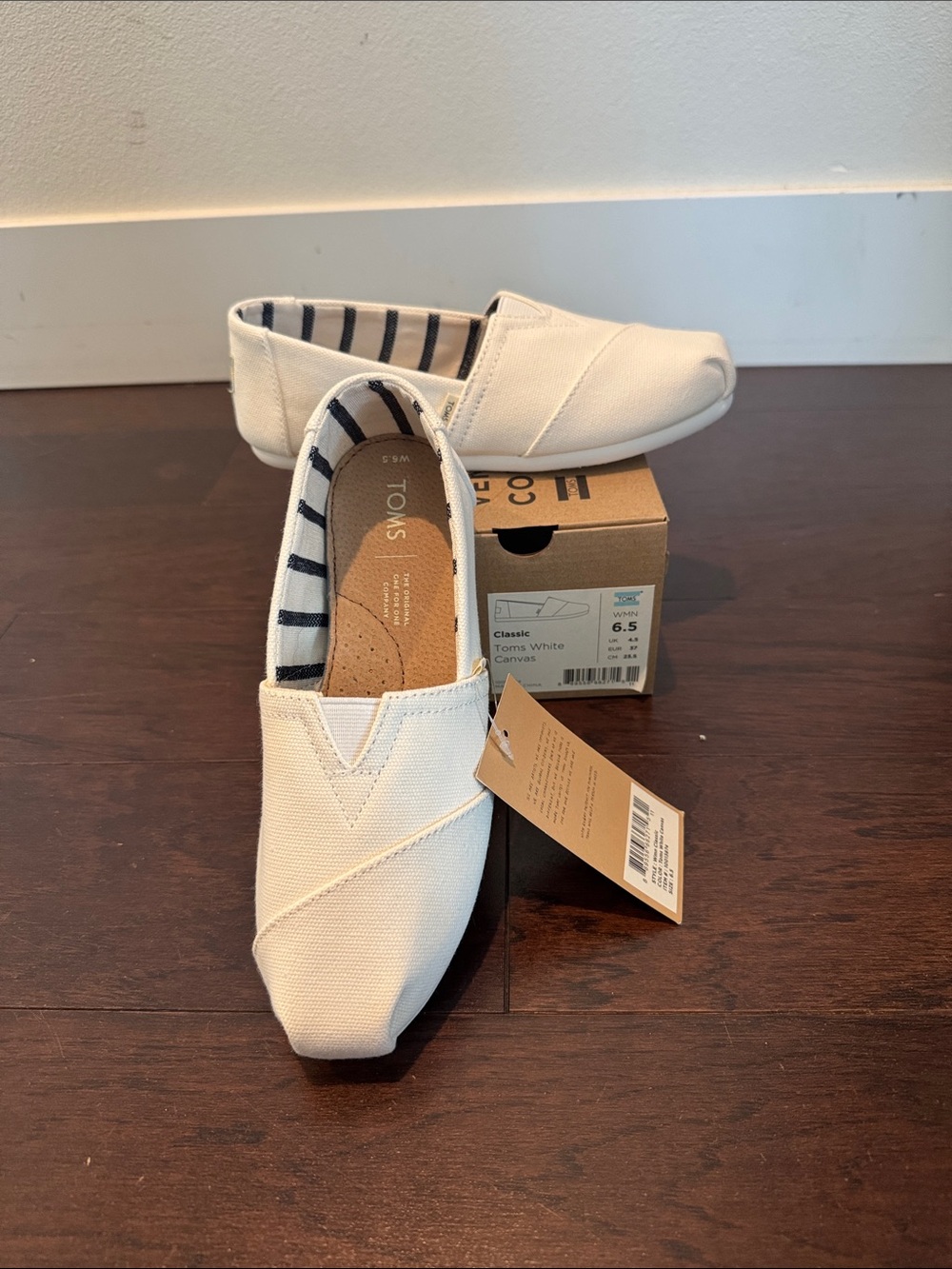 Toms Canvas Slip-On Sneakers in White with Striped Lining